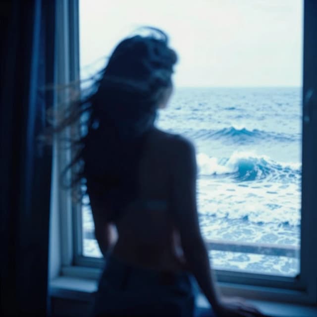 there is a blurry photo of a person looking out a window, blue monochromatic, tall backlit waves, 2 0 1 0, archival pigment print, with textured hair and skin, in motion, photoscanned, female photography